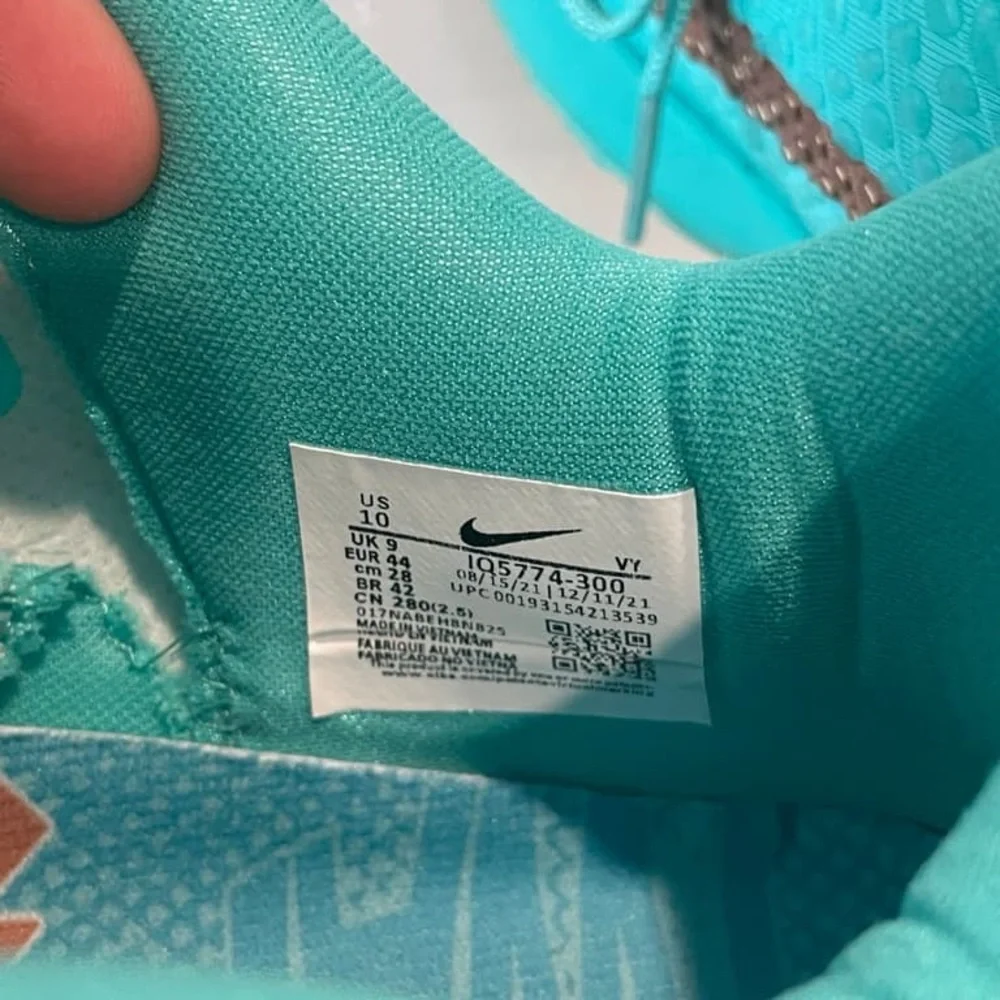 Nike Men’s Teal Basketball Sneakers with Metallic Copper Swoosh